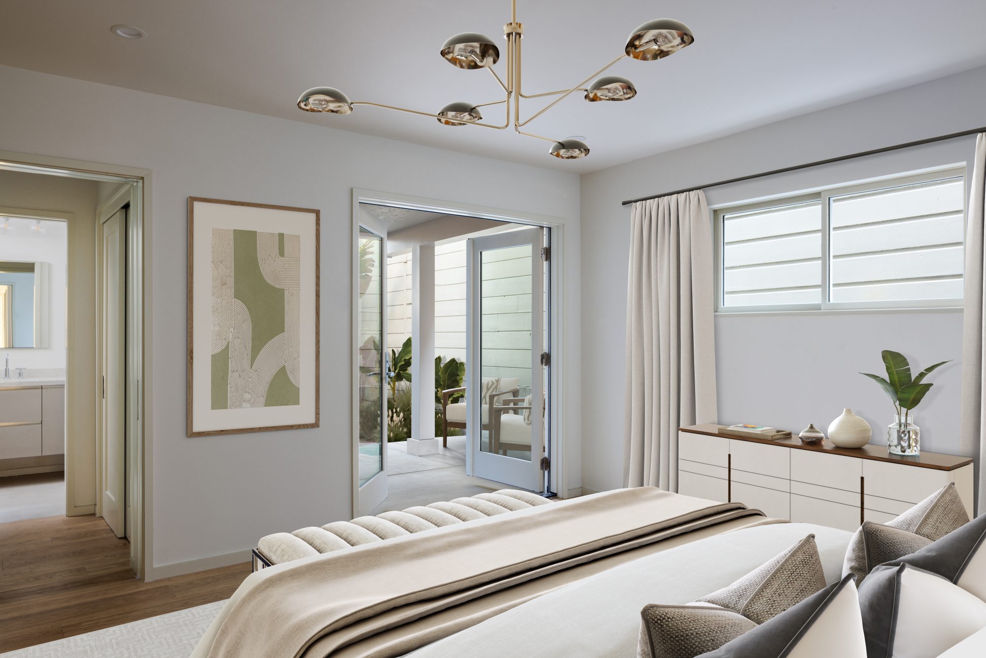 Primary bedroom with brass sputnik chandelier and French doors to a courtyard